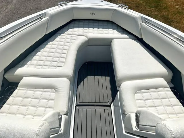 Slide: The Image of 2021 Cobalt R7 Surf boat interior with white seating and modern design. - 15