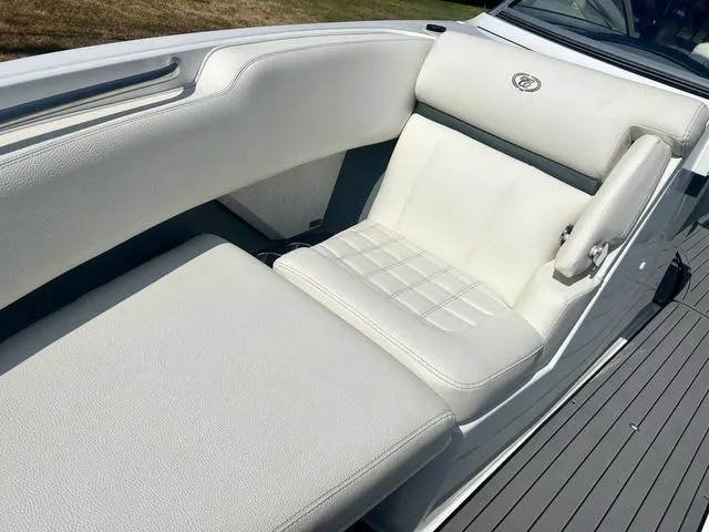 Slide: The Image of Open storage compartment on a 2021 Cobalt R7 Surf boat. - 17