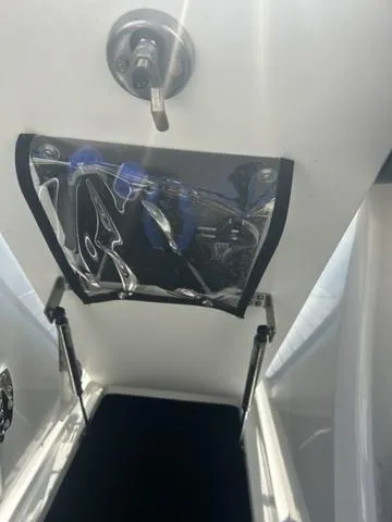 Slide: The Image of 2021 Cobalt R7 Surf boat interior with modern dashboard and seating. - 26