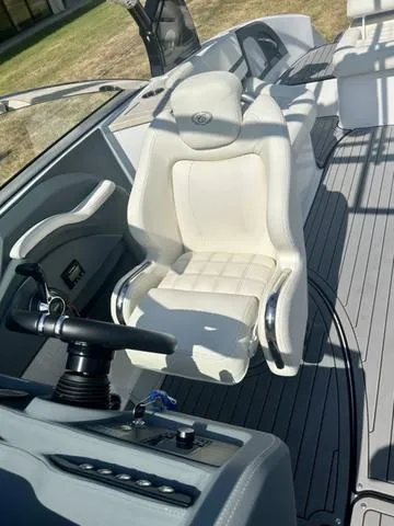 Slide: The Image of 2021 Cobalt R7 Surf boat storage compartment with clear cover and latch. - 27
