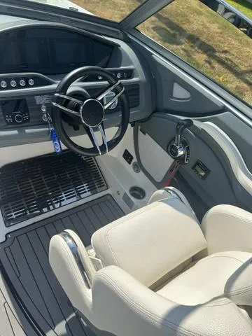 Slide: The Image of 2021 Cobalt R7 Surf interior storage compartment with USB and 12V power outlets. - 34