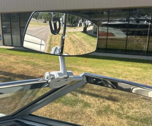 Slide: The Image of 2021 Cobalt R7 Surf boat dashboard with steering wheel and control panel. - 37