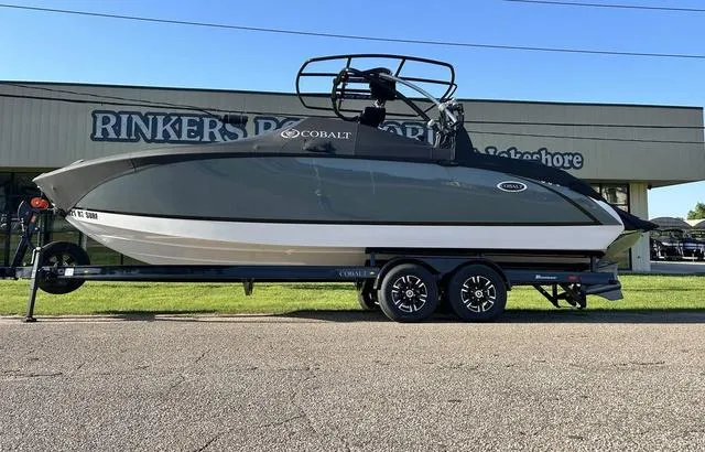 Slide: The Image of 2021 Cobalt R7 Surf boat on trailer at Rinker's Boat World dealership. - 4