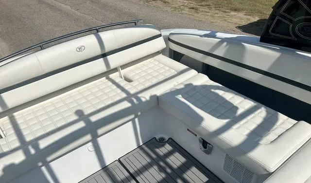 Slide: The Image of 2021 Cobalt R7 Surf boat with white leather seating and modern design. - 40