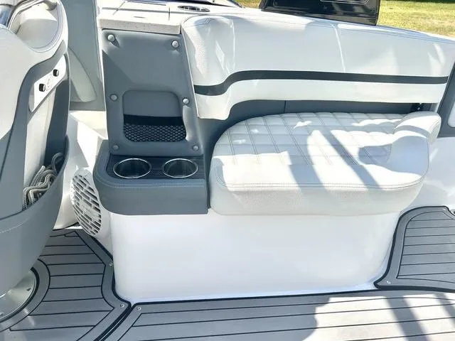 Slide: The Image of 2021 Cobalt R7 Surf boat interior with seating and cup holders. - 43