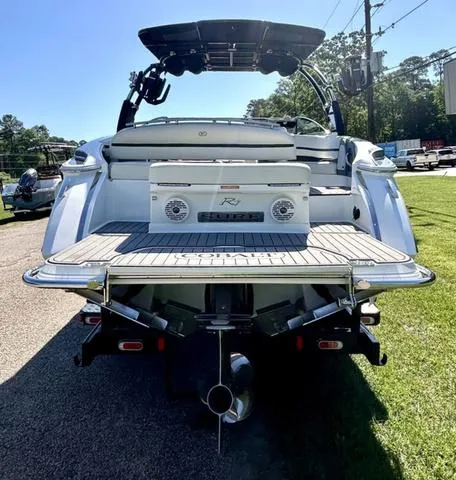 Slide: The Image of 2021 Cobalt R7 Surf boat on a trailer, side view. - 6