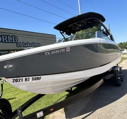 Slide: The Image of 2021 Cobalt R7 Surf boat on a trailer, front view. - 7