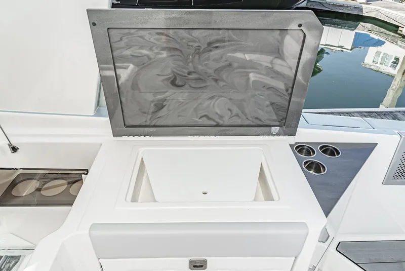 Slide: The Image of 2024 Aviara AV 32 boat sink and countertop with cup holders. - 24