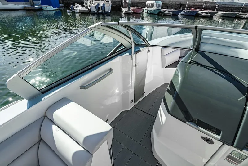 Slide: The Image of 2024 Aviara AV 32 boat interior with sleek design and waterfront view. - 37