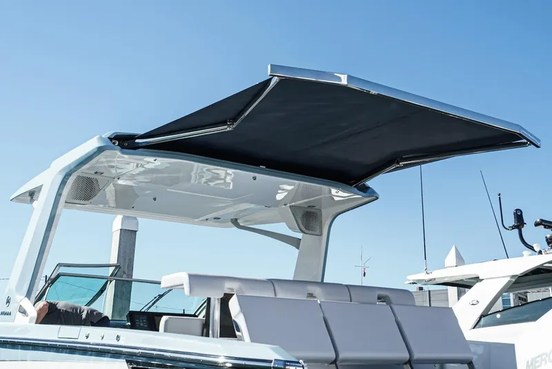 Slide: The Image of 2024 Aviara AV 32 boat with extended sunshade canopy. - 8