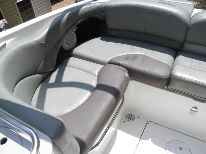 Slide: The Image of 2006 MasterCraft 280 SST boat interior with gray leather seating. - 16