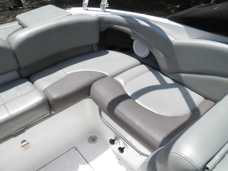 Slide: The Image of 2006 MasterCraft 280 SST boat interior with gray and white seating. - 17