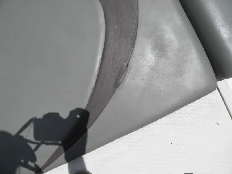 Slide: The Image of 2006 MasterCraft 280 SST boat seat with minor wear and tear. - 19