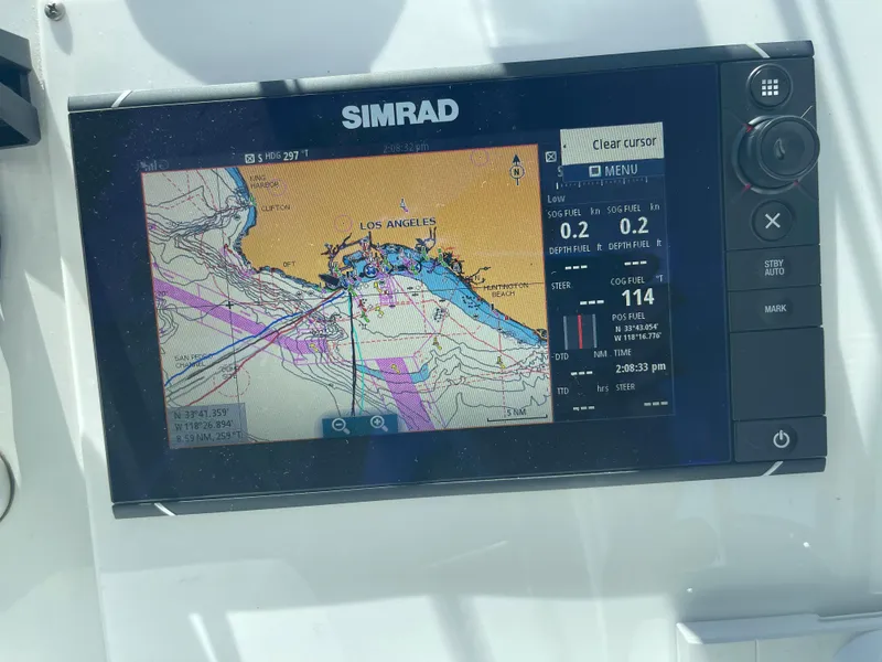 Slide: The Image of Simrad marine GPS displaying navigation map on Glacier Bay Ocean Runner 3470, 2004 model. - 27