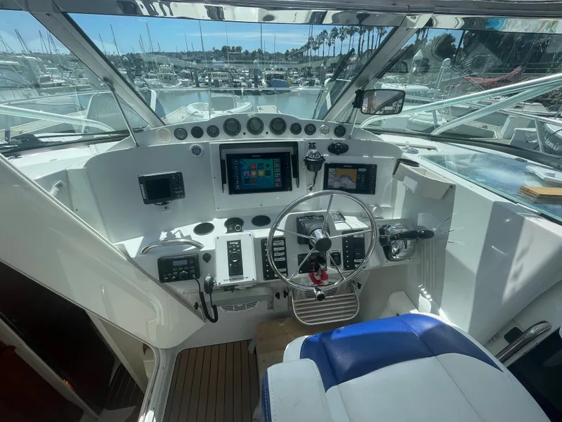 Slide: The Image of Helm of 2004 Glacier Bay Ocean Runner 3470 with modern navigation equipment and controls. - 8