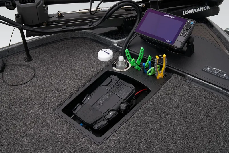 Slide: The Image of Nitro Z20 Pro 2024 boat dashboard with Lowrance fishfinder and organized fishing tools. - 14