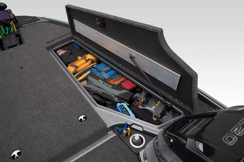 Slide: The Image of 2024 Nitro Z20 Pro boat storage compartment with organized fishing gear. - 22