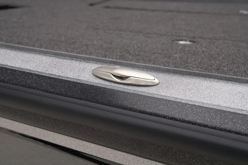 Slide: The Image of 2024 Nitro Z20 Pro boat deck with a sleek, metallic finish and a recessed cleat. - 24