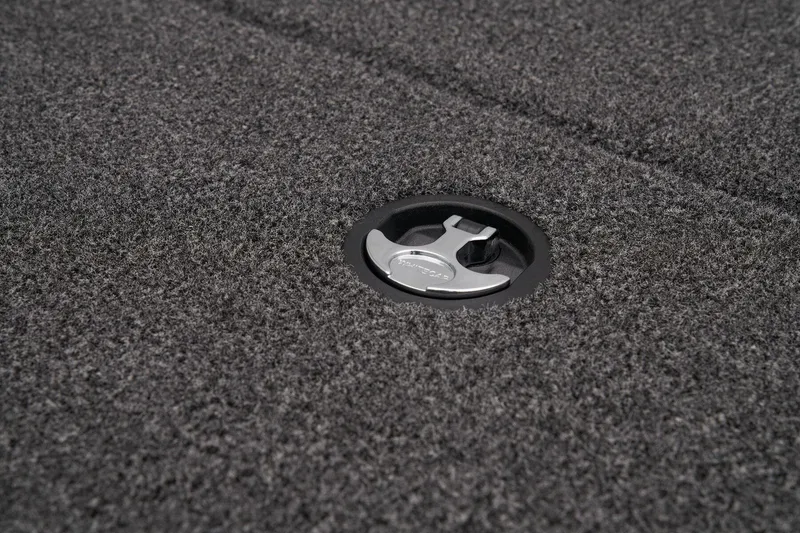 Slide: The Image of Close-up of 2024 Nitro Z20 Pro carpeted deck with latch. - 25