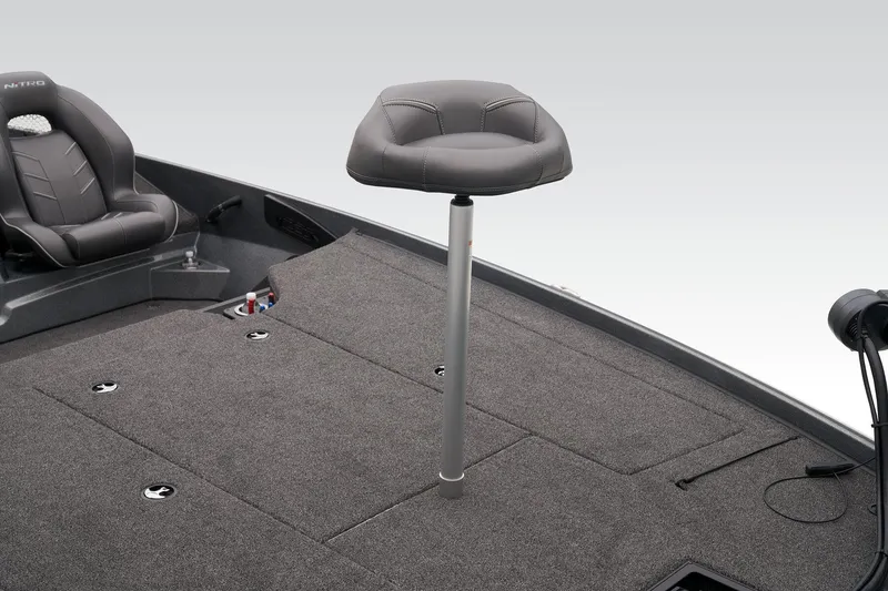 Slide: The Image of 2024 Nitro Z20 Pro boat deck with seating and storage compartments. - 26