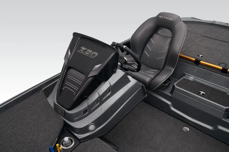 Slide: The Image of 2024 Nitro Z20 Pro boat cockpit with steering wheel and seat. - 27
