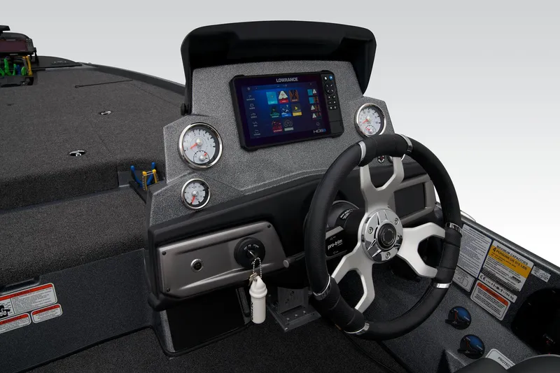 Slide: The Image of 2024 Nitro Z20 Pro boat dashboard with advanced navigation system and steering wheel. - 33
