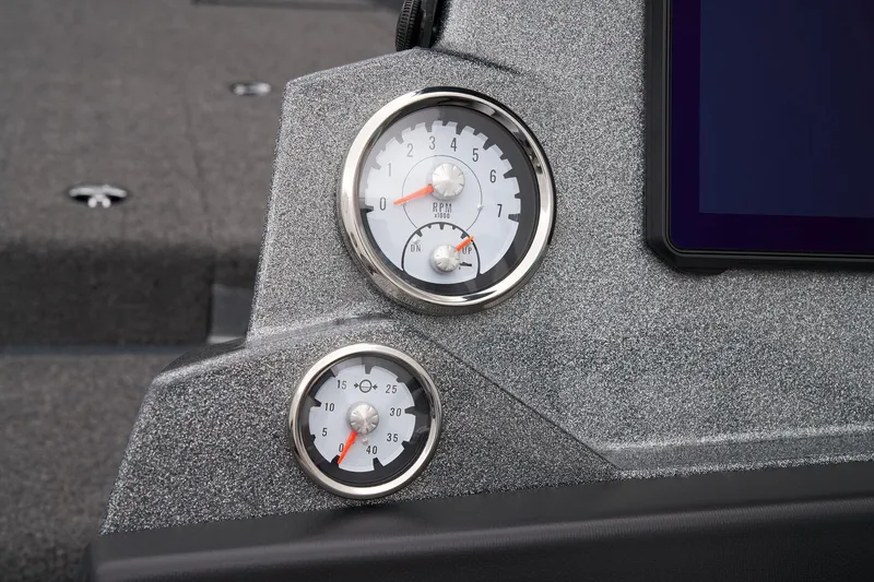 Slide: The Image of Close-up of 2024 Nitro Z20 Pro boat dashboard gauges. - 38