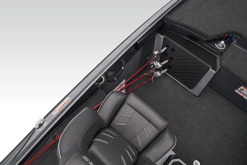 Slide: The Image of 2024 Nitro Z20 Pro boat interior with rod storage and seating. - 44