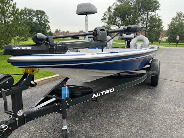 Slide: The Image of 2024 Nitro Z18 Pro fishing boat on trailer with Lowrance equipment. - 2