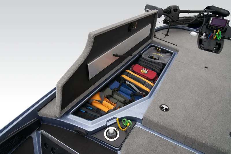 Slide: The Image of 2024 Nitro Z18 Pro boat storage compartment with organized fishing gear. - 24