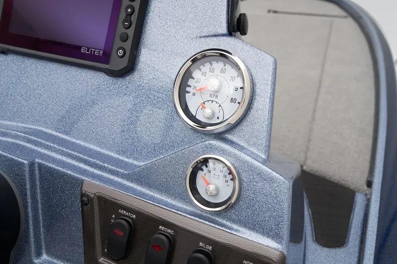 Slide: The Image of 2024 Nitro Z18 Pro boat dashboard with gauges and control panel. - 42