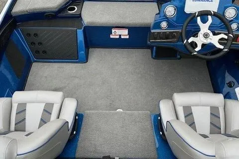 Slide: The Image of 2024 Nitro Z18 Pro boat interior with gray carpet and dual seats. - 7