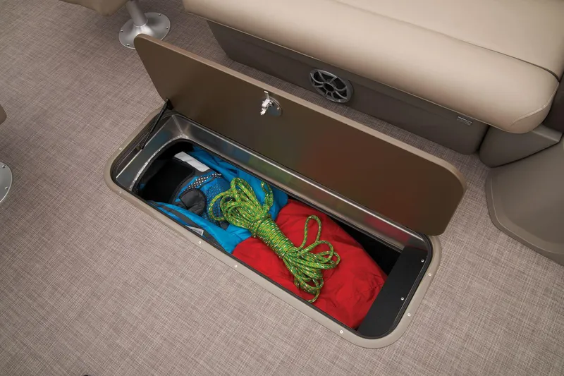 Slide: The Image of Under-seat storage compartment in 2024 Sun Tracker Sportfish 24 XP3 boat. - 35