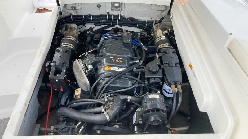 Slide: The Image of 2001 Chris-Craft Launch 25 engine compartment with visible engine components. - 11