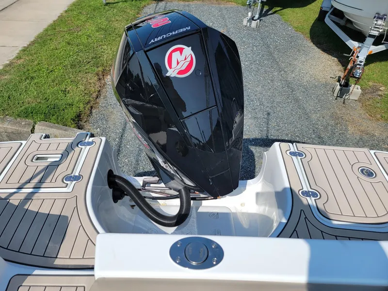 Slide: The Image of 2024 Hurricane SunDeck 217 OB boat with Mercury outboard motor. - 19