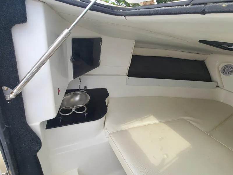 Slide: The Image of 2009 Glasstream 360 SCX cabin interior with sink and seating area. - 15