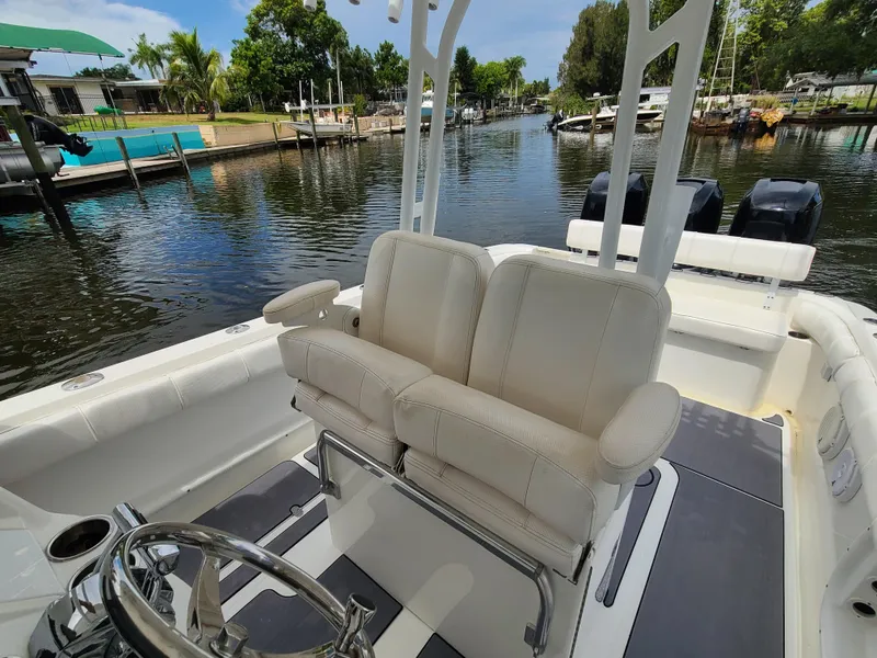 Slide: The Image of 2009 Glasstream 360 SCX boat interior with dual seats and steering wheel. - 25