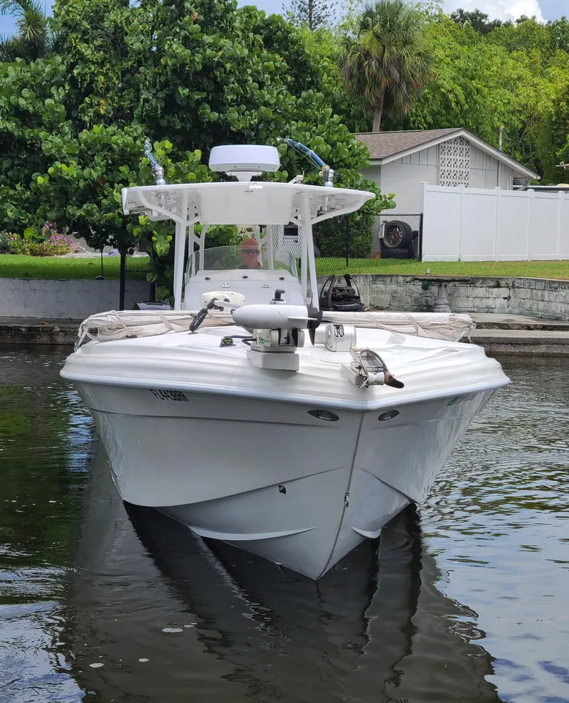Slide: The Image of 2009 Glasstream 360 SCX boat docked in a serene canal. - 3
