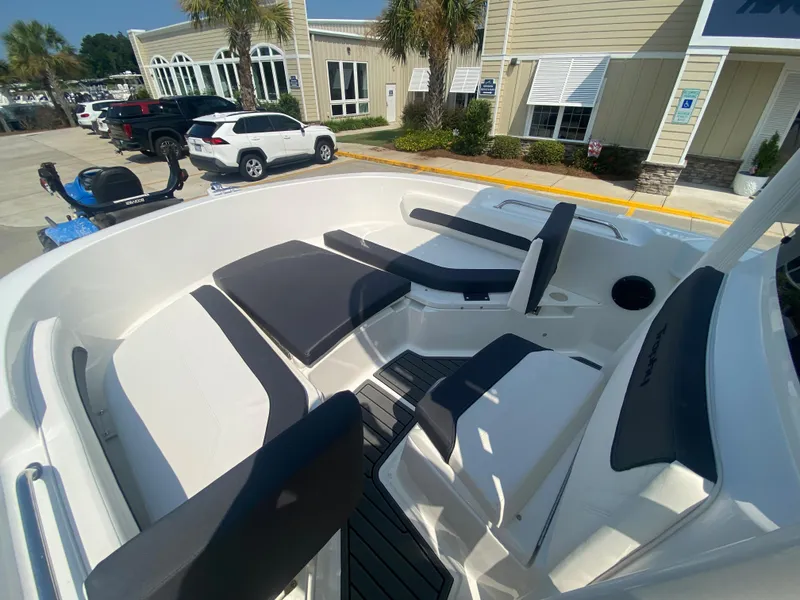 Slide: The Image of 2024 Bayliner Trophy 20 CC boat interior with seating and console. - 14