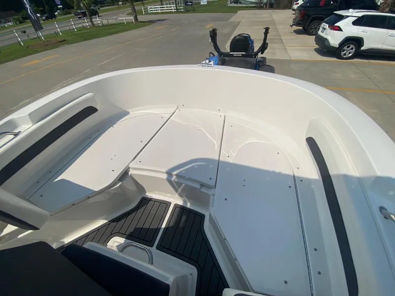 Slide: The Image of 2024 Bayliner Trophy 20 CC boat interior, spacious seating and deck area. - 19