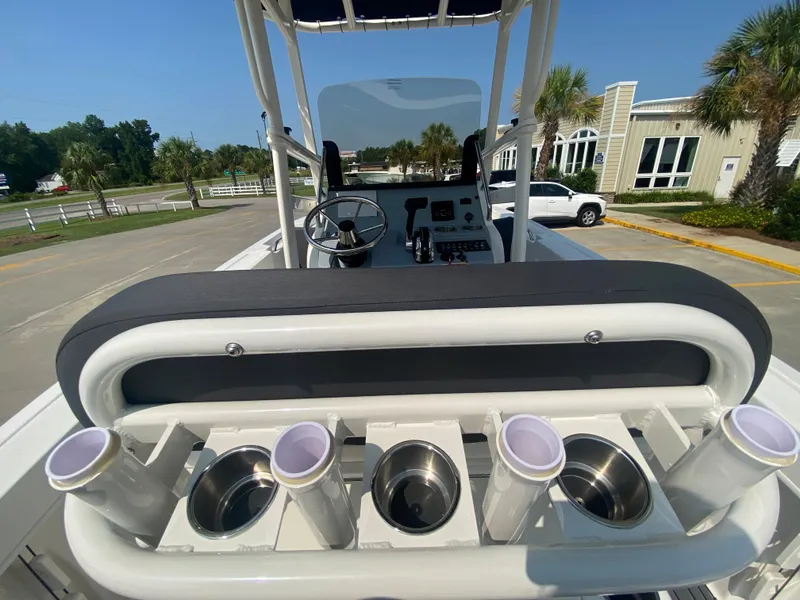 Slide: The Image of 2024 Bayliner Trophy 20 CC center console with rod holders and cup holders. - 10