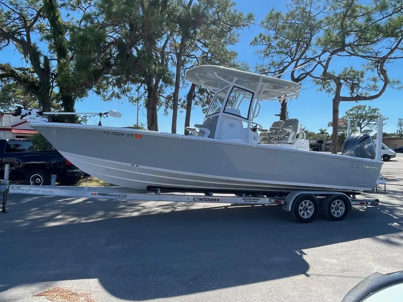 Slide: The Image of 2021 Sportsman Masters 267OE Bay Boat on trailer in outdoor setting. - 14