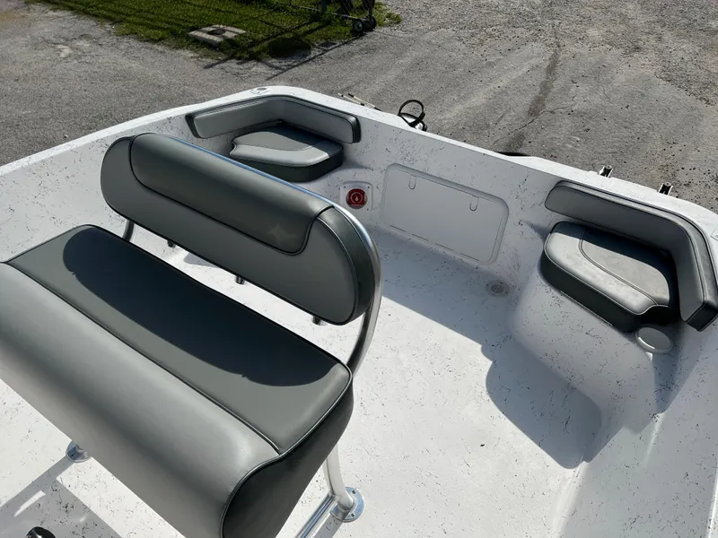 Slide: The Image of 2024 ALK2 Powerboats 22 CRS interior seating and deck view. - 11