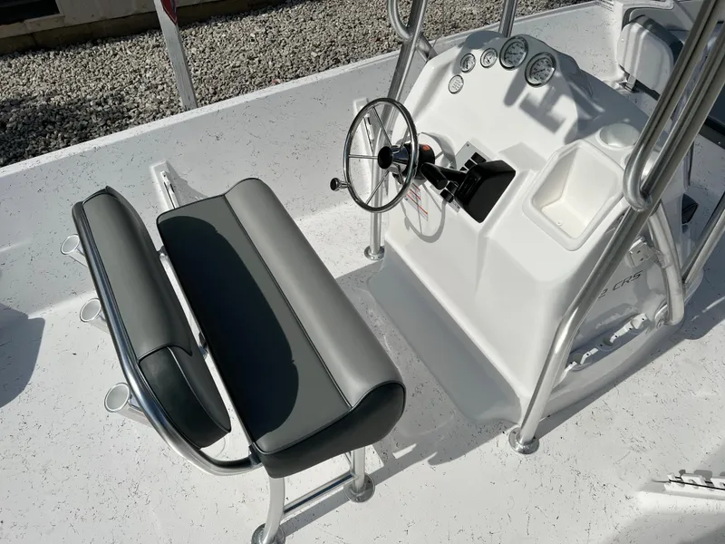 Slide: The Image of 2024 ALK2 Powerboats 22 CRS console and seating area. - 13