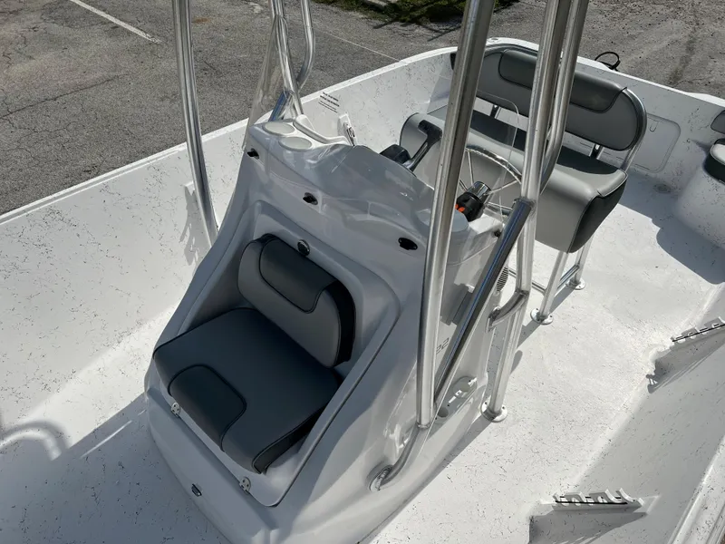 Slide: The Image of 2024 ALK2 Powerboats 22 CRS center console with seating and stainless steel frame. - 17