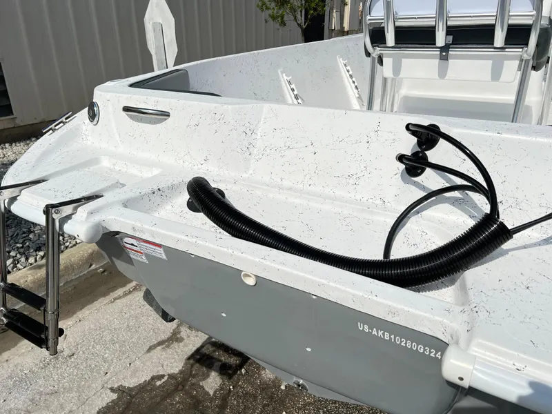 Slide: The Image of 2024 ALK2 Powerboats 22 CRS, rear view with ladder and wiring. - 4