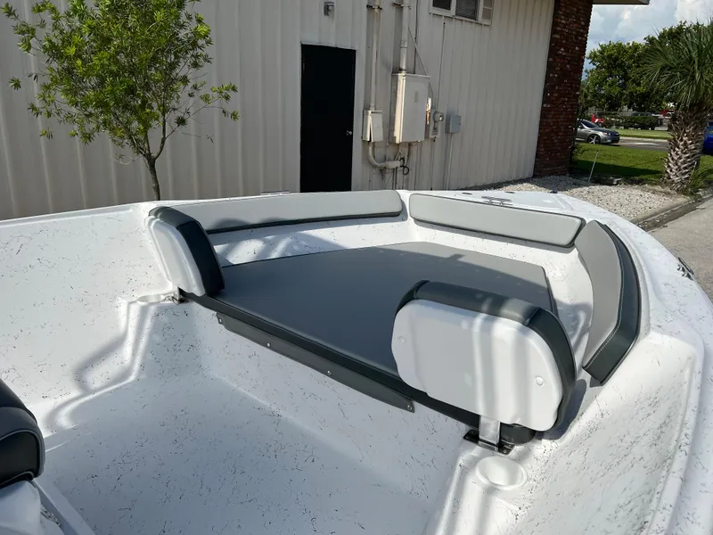 Slide: The Image of 2024 ALK2 Powerboats 22 CRS bow seating area with cushioned seats and backrests. - 6