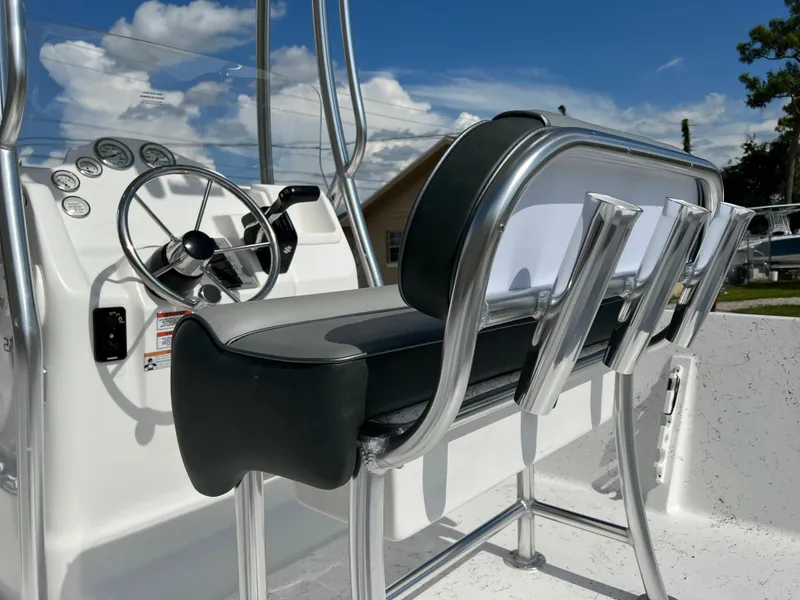 Slide: The Image of 2024 ALK2 Powerboats 22 CRS center console with steering wheel and seating. - 9