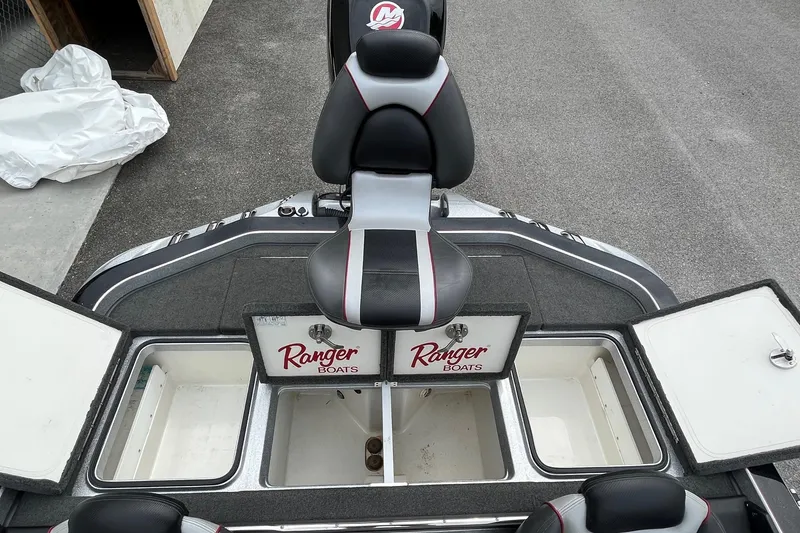 Slide: The Image of 2016 Ranger Z520C boat with open storage compartments and seating. - 12
