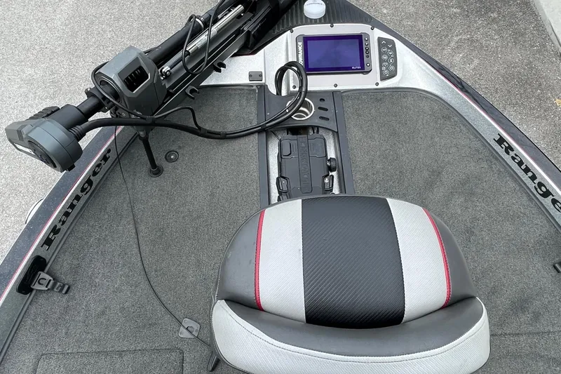 Slide: The Image of 2016 Ranger Z520C boat interior with seat, control panel, and equipment. - 3